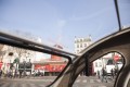 2CV with driver in front of the Moulin Rouge